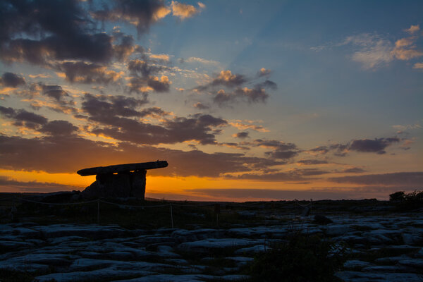 5000 years old Polnabrone Dolmen in Burren, National Park Sunset