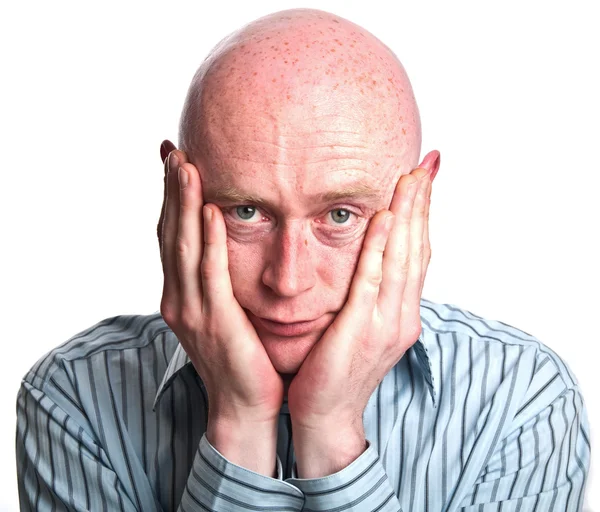 Male with hand to face with worry — Stock Photo, Image