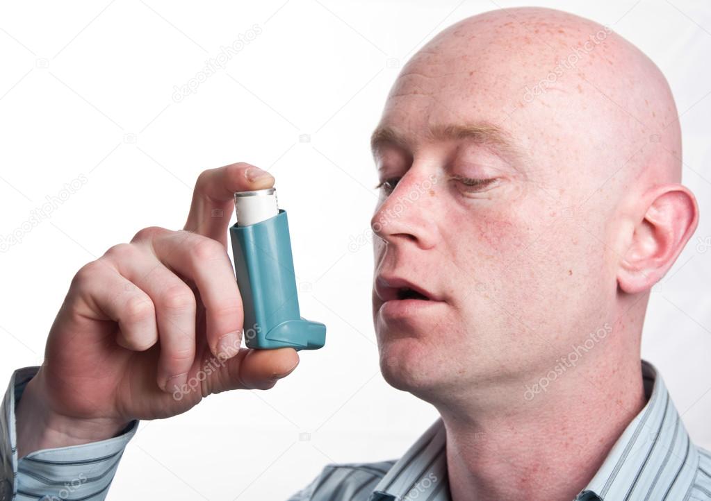 male with inhaler on white backdrop