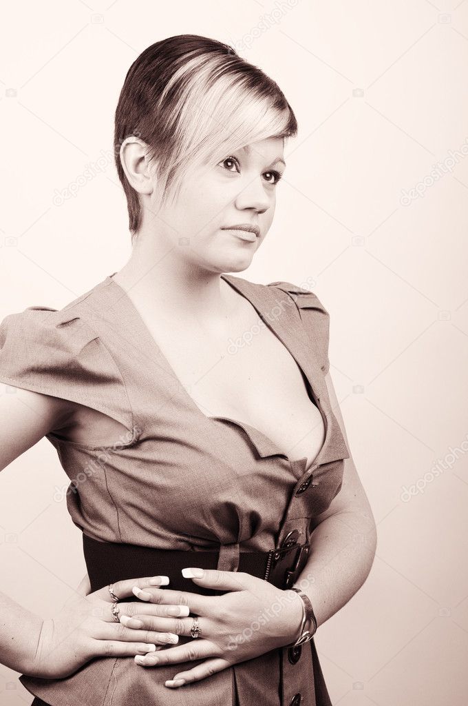 Copper toned  Shot of a Confident Young Office Woman . Plain Wal