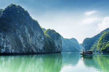Tourist boat in the Ha Long Bay of the South China Sea, Vietnam clipart