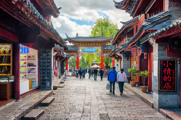 Ancient street with souvenir shops in the Old Town of Lijiang