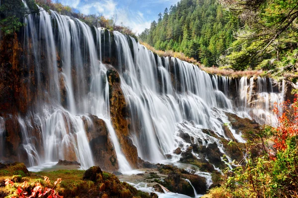 Amazing view of the Nuo Ri Lang Waterfall (Nuorilang) — Stock Photo, Image