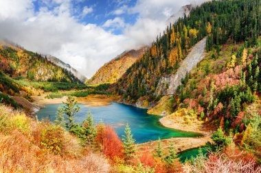 Fantastic view of the Upper Seasonal Lake with azure water clipart