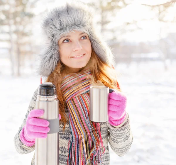 Winter portrait of young woman in fur hat — Stock Photo, Image