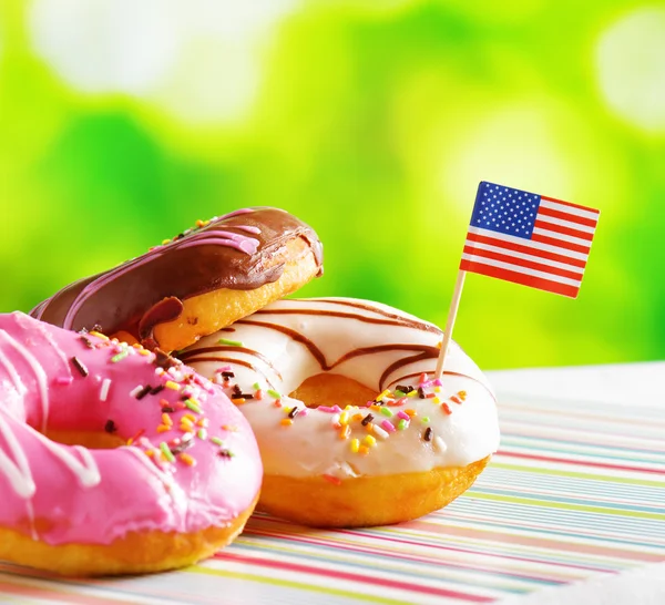 Colorful donuts with flag of USA — Stock Photo, Image