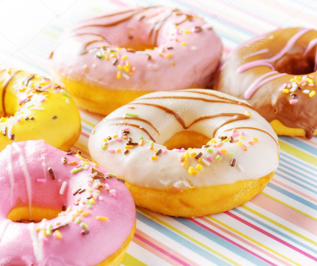 Colorful donuts on a striped napkin