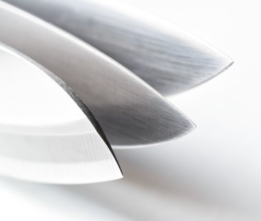 Three knives on white background clipart