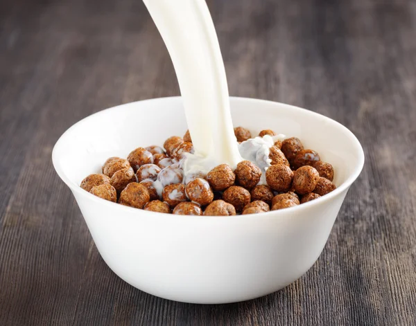 Bowl of chocolate cereal on a table — Stock Photo, Image