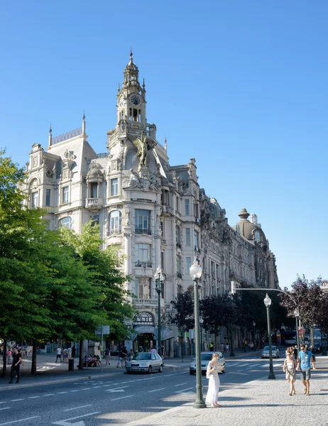 The building with the clock tower on the Liberty Square in Porto — Stock Photo, Image