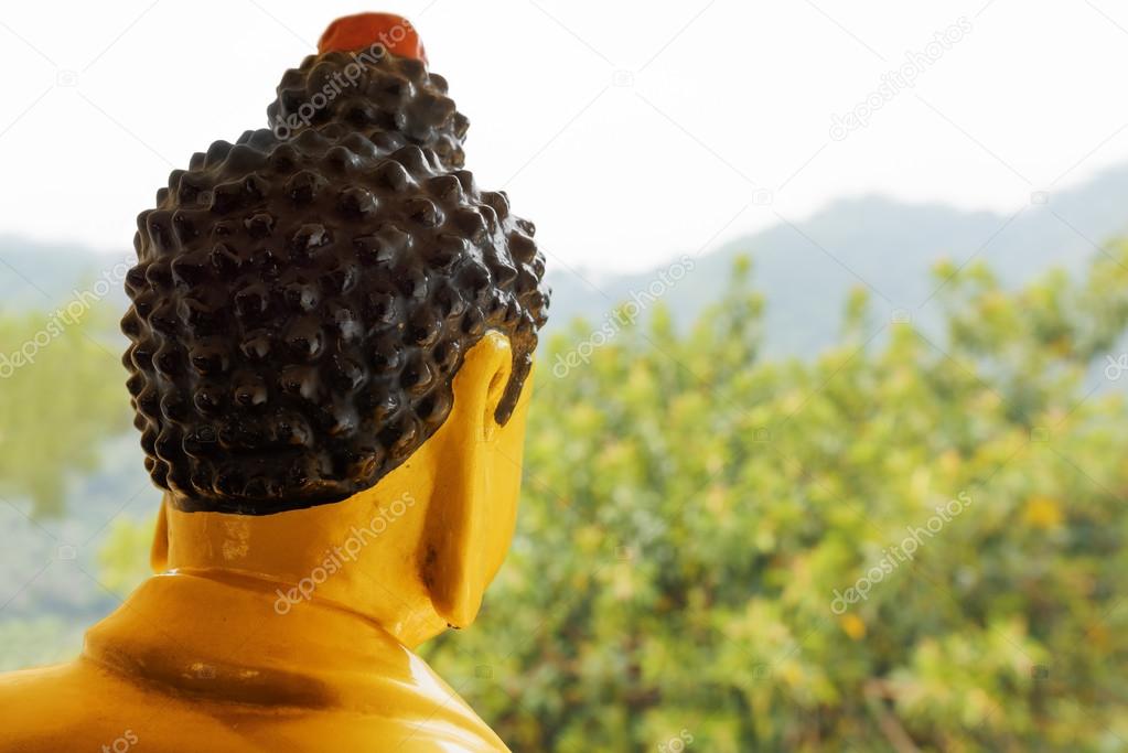 Buddha statue watches over surroundings of the Ten Thousand Budd