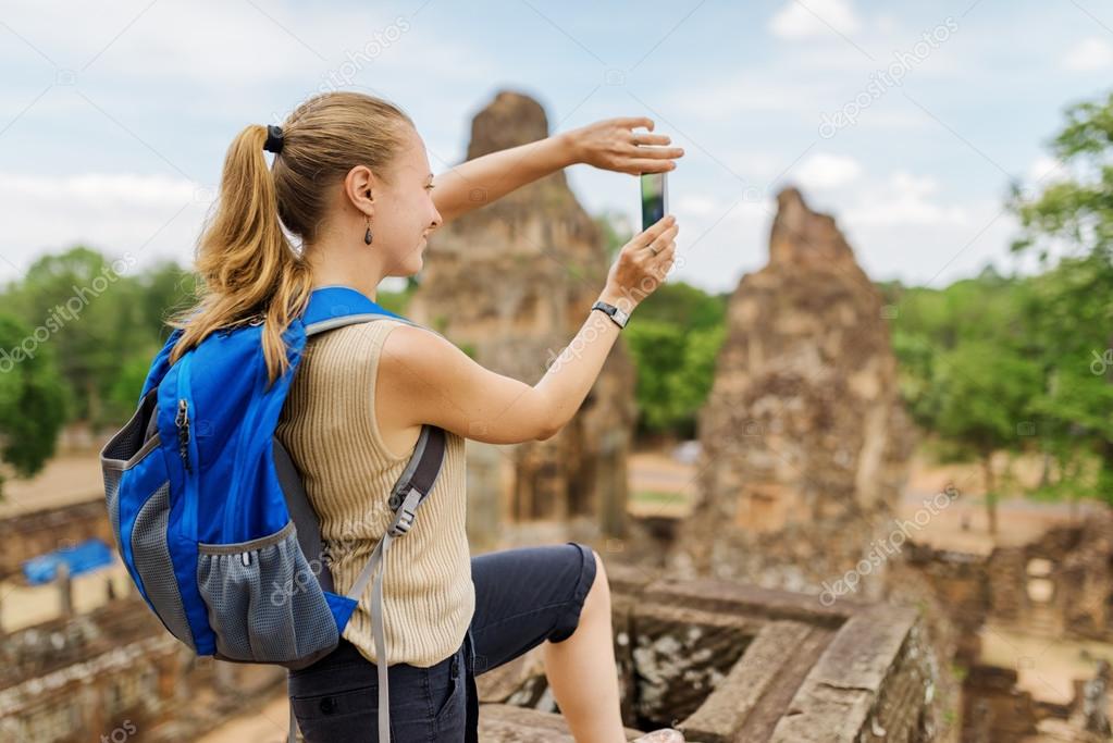 Tourist taking picture of the Pre Rup, Angkor, Cambodia