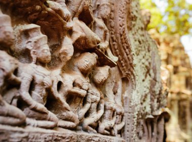 Ancient bas-relief at Ta Prohm temple in Angkor, Cambodia