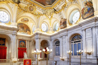 Frescoes and moldings on the vaulted ceiling in the interior of 