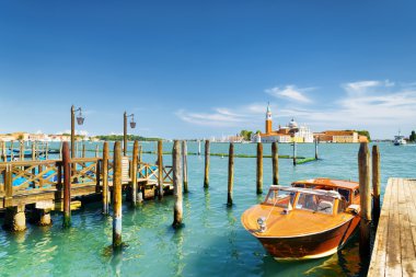 Boat parked beside the Riva degli Schiavoni, Venice, Italy