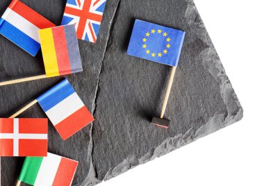 Political concept with small flags of the European Union (EU)