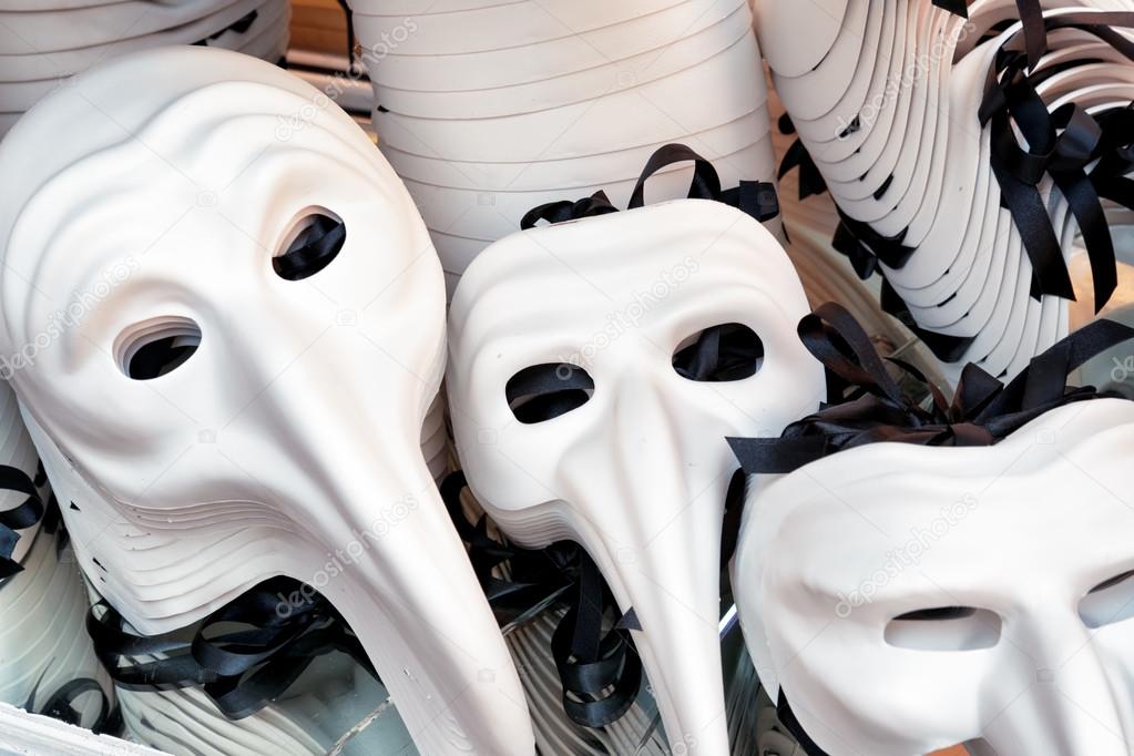 Zanni Venetian masks in shop on the Rialto Bridge, Venice, Italy