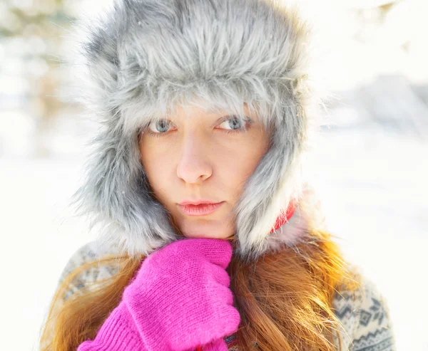 Winter portrait of young woman in fur hat — Stock Photo, Image