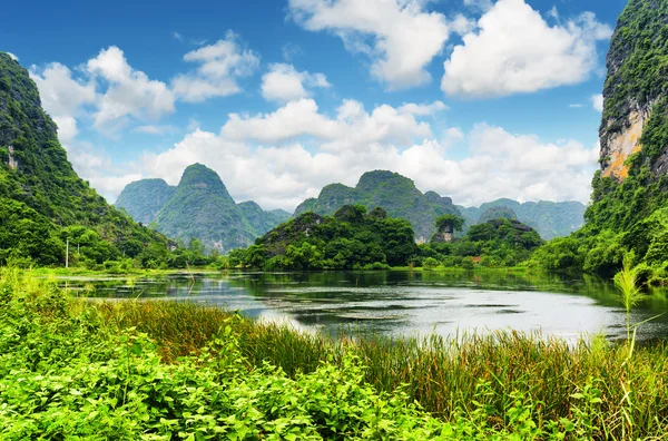 Scenic view of lake among karst towers at Ninh Binh, Vietnam