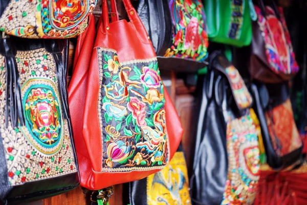 Handmade bags decorated with traditional Chinese embroidery — стокове фото