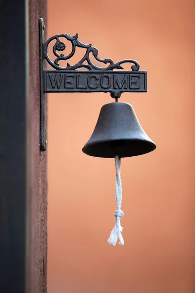 Classic Brass Door Bell with Orange Wall background — Stock Photo, Image