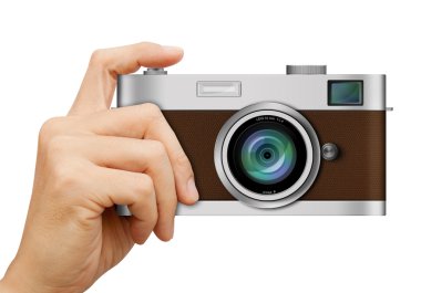 Beyaz arka plan üzerinde elinde klasik fotoğraf makinesi