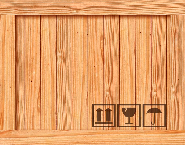 Safety fragile icon on wooden box with space — Stock Photo, Image