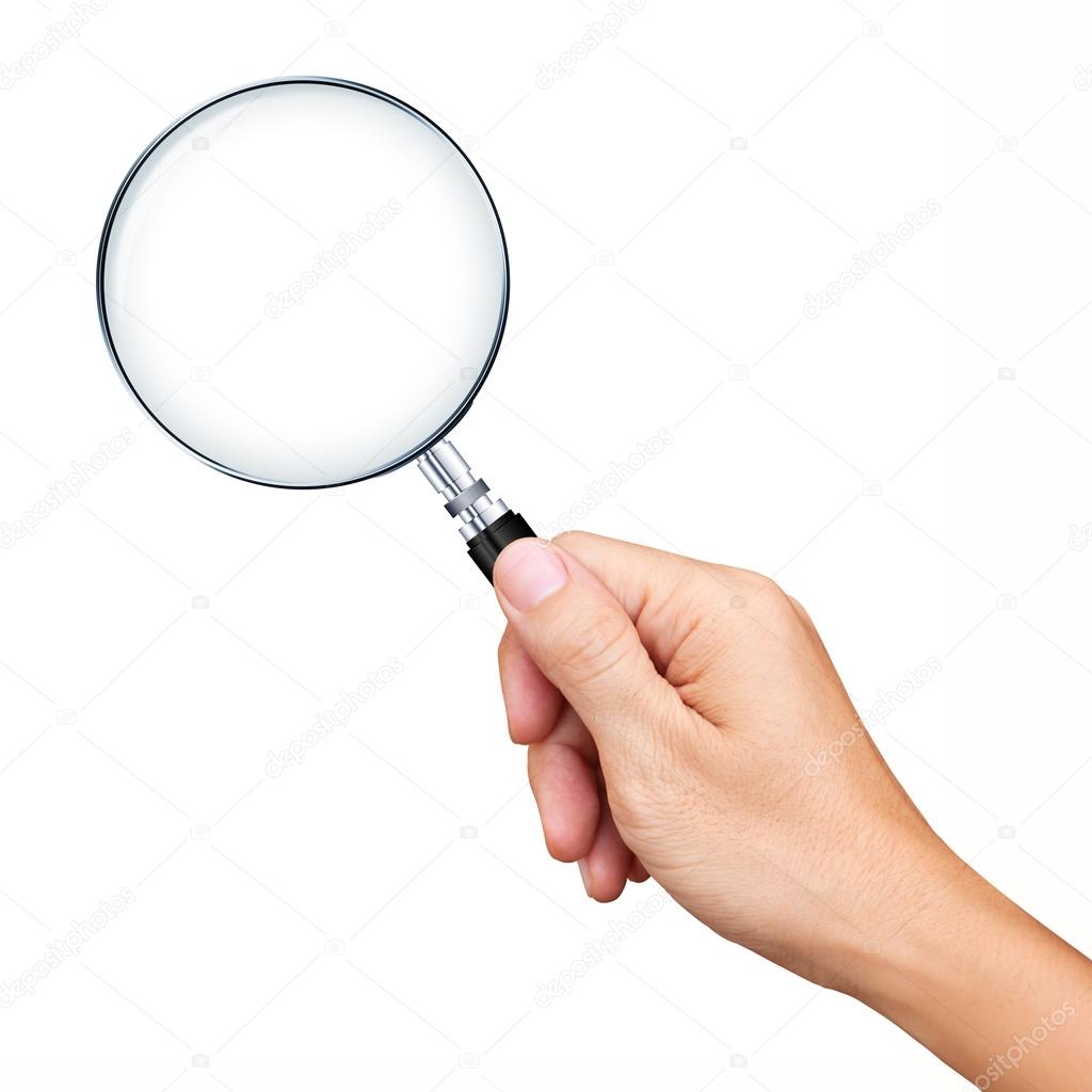 Hand holding magnifying glass isolated on white background