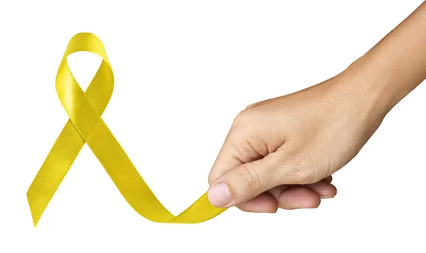 Hand Make Yellow Ribbon for Bone Cancer symbol on white — Stock Photo, Image