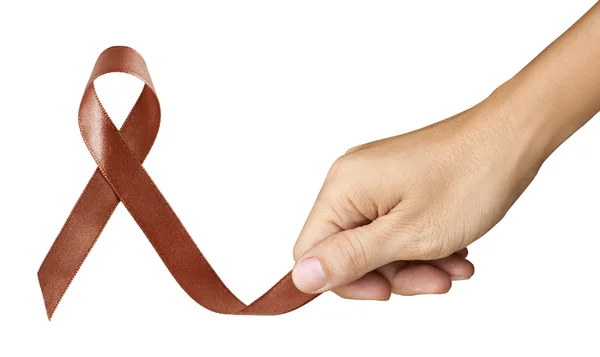 Hand machen braune Schleife für Darmkrebs Symbol auf weiß — Stockfoto