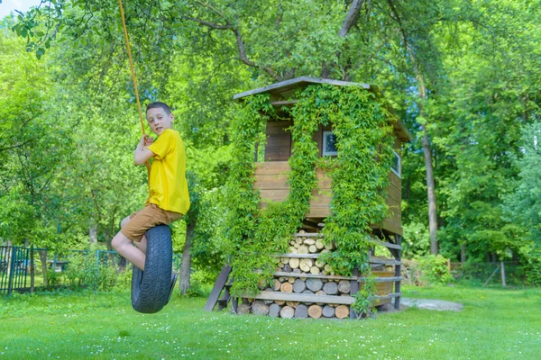 Smiling Boy Yellow Shirt Playing Swing Tire — Stock Photo, Image