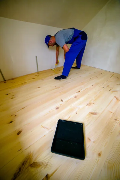 Worker Paint Roller Varnishing Wooden Floor — Stock Photo, Image