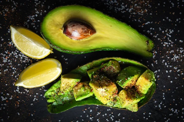 Fresh avocado fruit on a wooden board — Stock Photo, Image