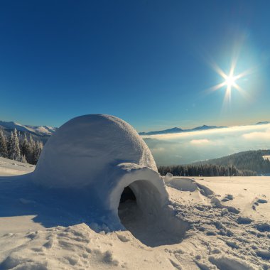 igloo in the high mountain clipart