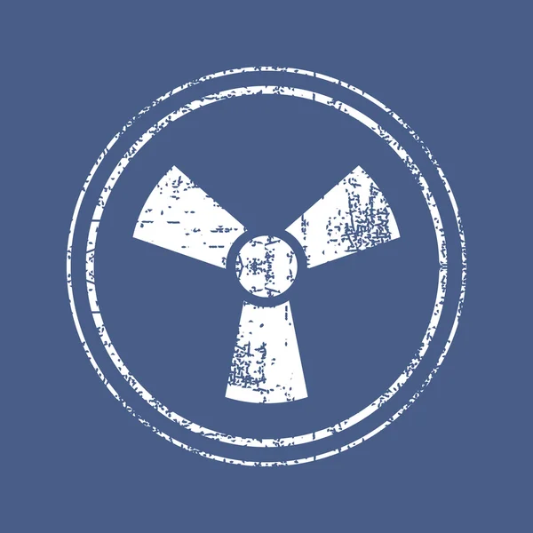 Символ радиоактивности на гранжевом фоне — стоковый вектор