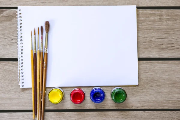 Art album and watercolor paint — Stock Photo, Image