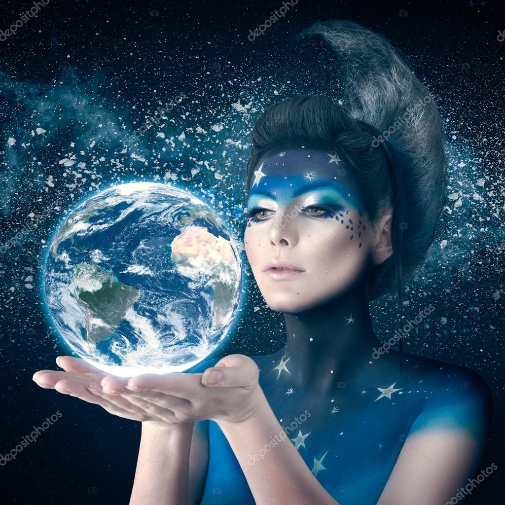 Moon woman holding planet earth — Stock Photo © Avesun 