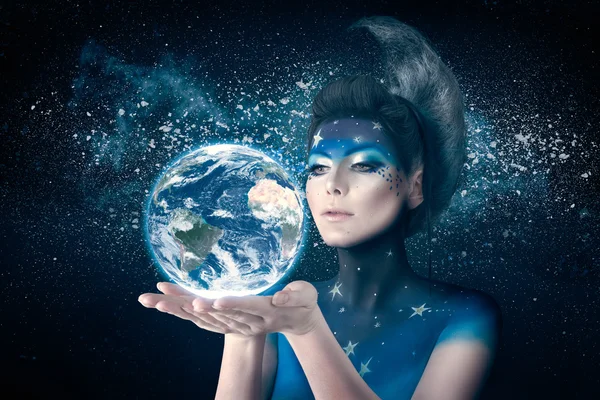 Moon woman holding planet earth — Stock Photo, Image