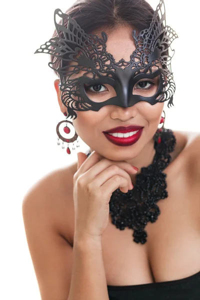 Mooie jonge vrouw in Venetiaanse carnaval masker — Stockfoto