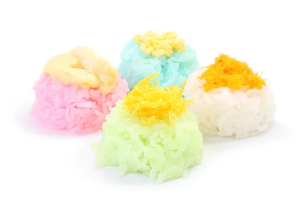 Múltipla cor de arroz pegajoso com creme de açúcar no chão branco . — Fotografia de Stock