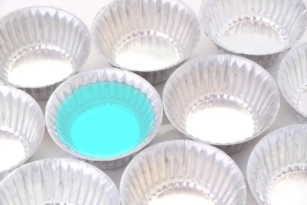 Blue jelly mold tin for bakery on white background. — Stock Photo, Image