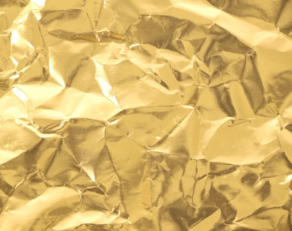 Морщинистая золотая бумага . — стоковое фото