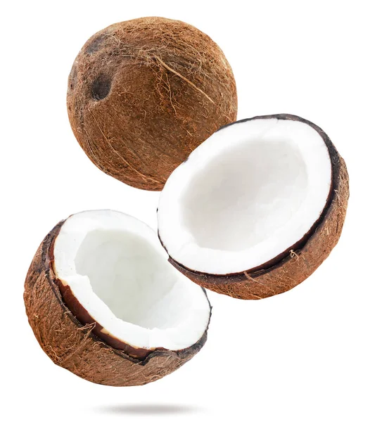 Kokos Całości Pół Spada Białe Tło Odizolowany Lewitujące Orzechy Kokosowe — Zdjęcie stockowe