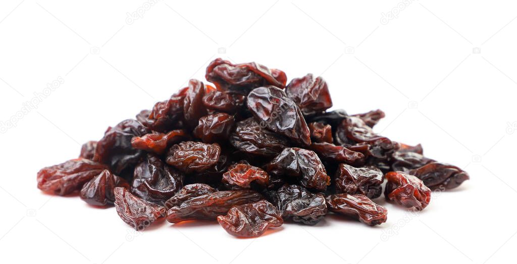 Heap of raisins on a white background. Isolated