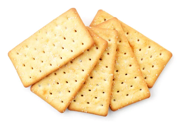 Galletas saladas sobre fondo blanco, aisladas. La vista desde arriba —  Fotos de Stock