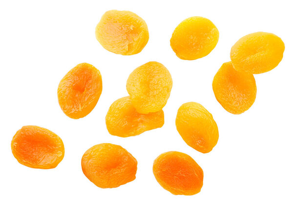 Dried apricots flying close-up on a white background, levitating. Isolated
