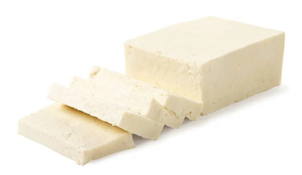 白い背景にスライスした豆腐チーズのクローズアップ — ストック写真