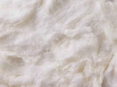 White cotton candy close-up, background. The view from top