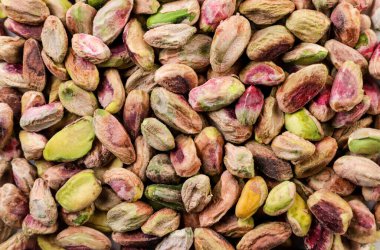 Soyulmuş fıstıklar, yakın plan, arka plan. Yukarıdan görünüm