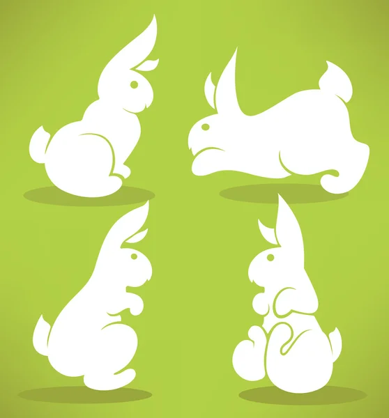 Wielkanoc biały króliki sylwetki — Wektor stockowy